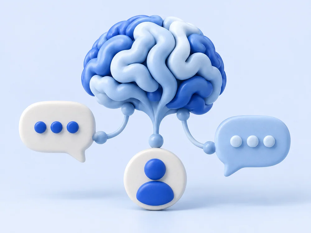 Cérebro com conexões ligado a balões de conversa e a um contato, representando atendimento com inteligência artificial.